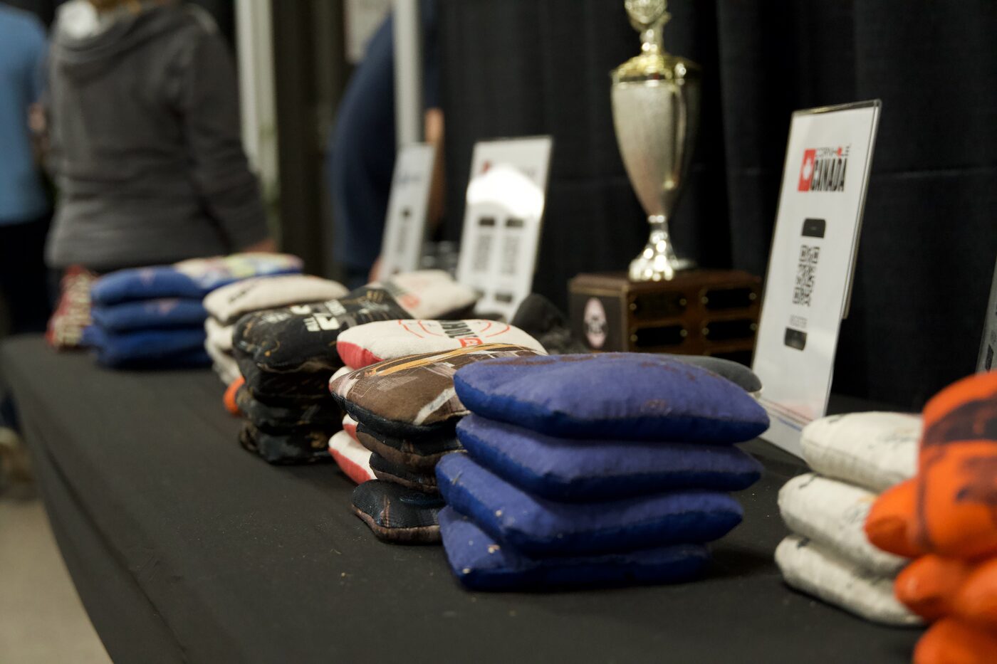 Cornhole bags and championship trophy